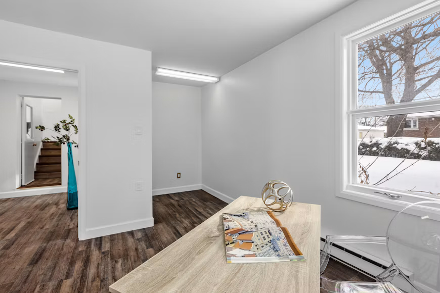 Contractor reviewing renovation plans on site